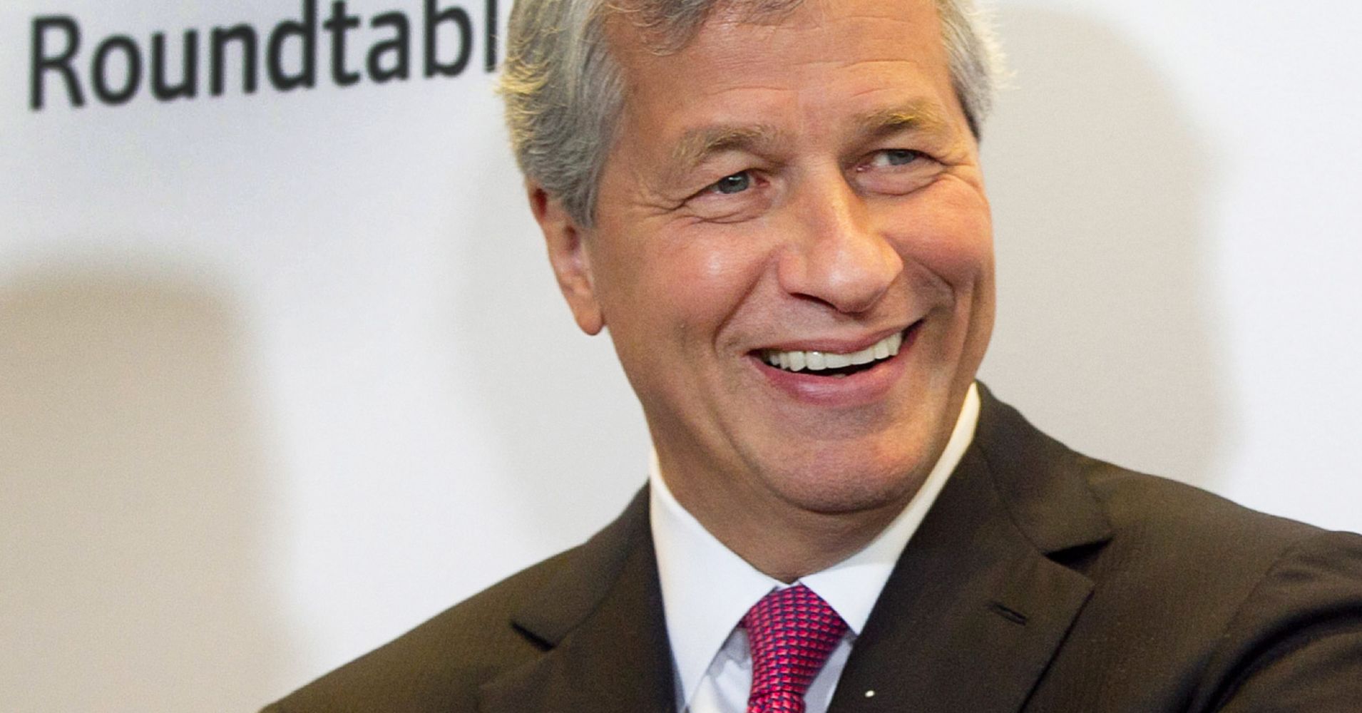 JP Morgan shares surge after bank posts record profit and revenue