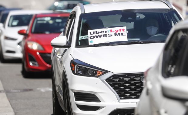 Uber and Lyft on Thursday defended against a lawsuit, brought by California and San Francisco,...