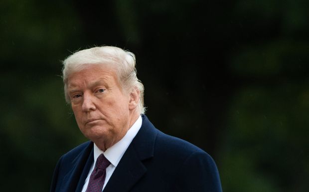 President Donald Trump walks from Marine One after a landing last week on the South...